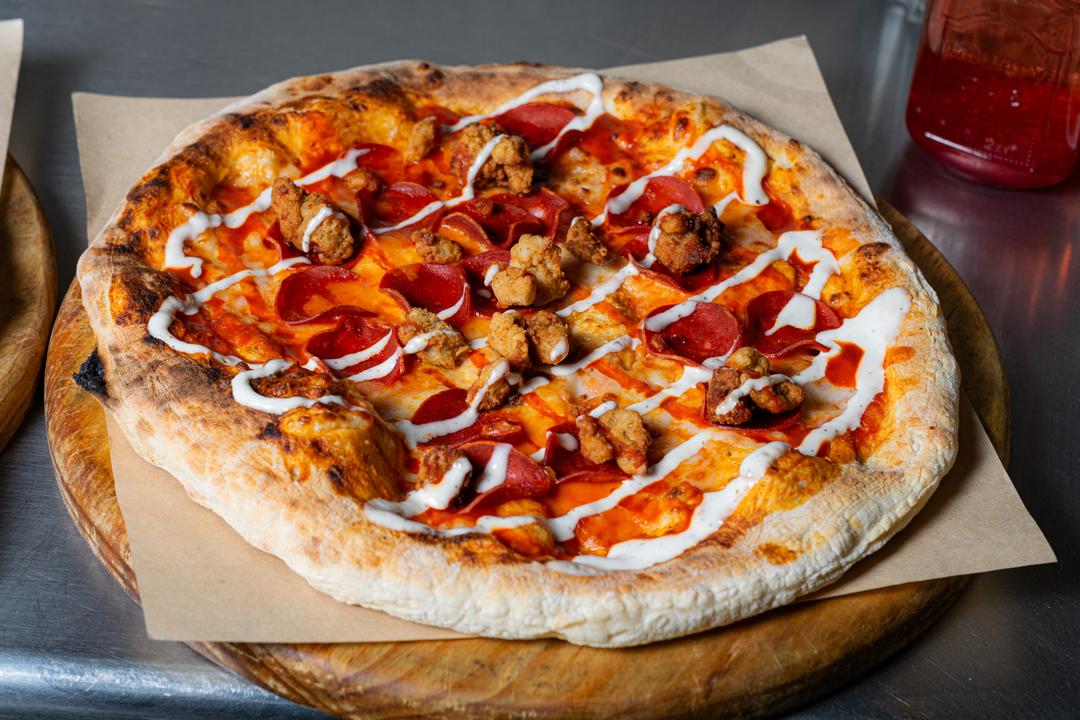 Restaurante 4 Cocinas - Paella | Pizzas | Pastas image 4