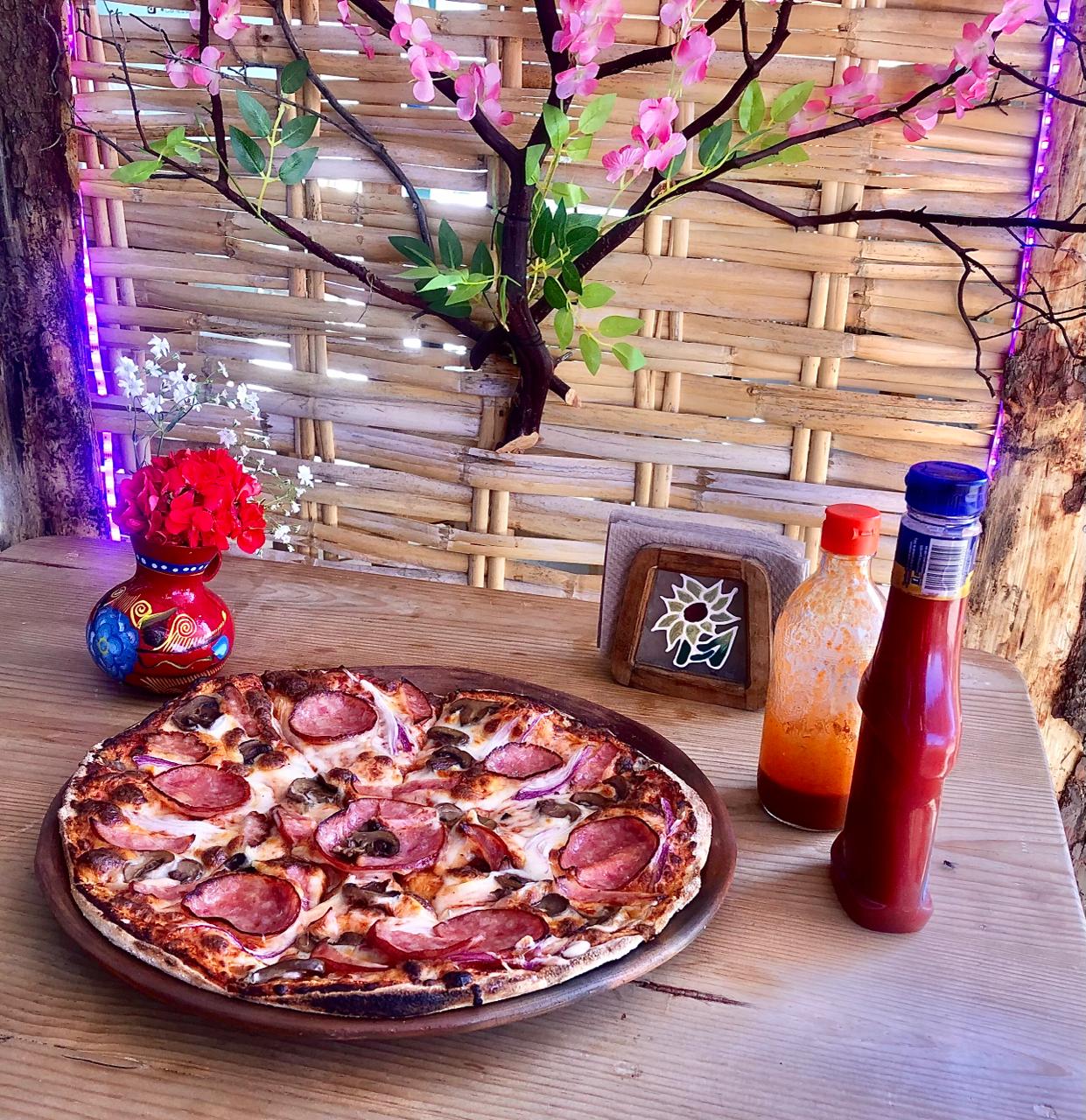 Carne asada, pizzas y más "EL PERI" image 2