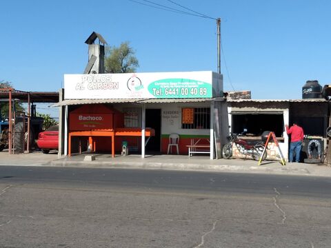 Pollos al Carbón el Compa Santos image 1