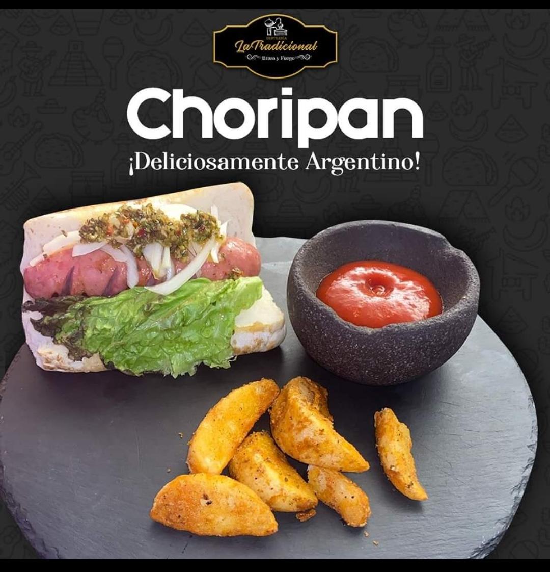 La Tradicional brasa y fuego image 2