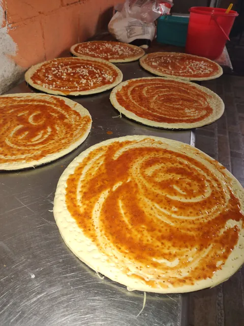 Raymond pizzas con el toque chingón image 8