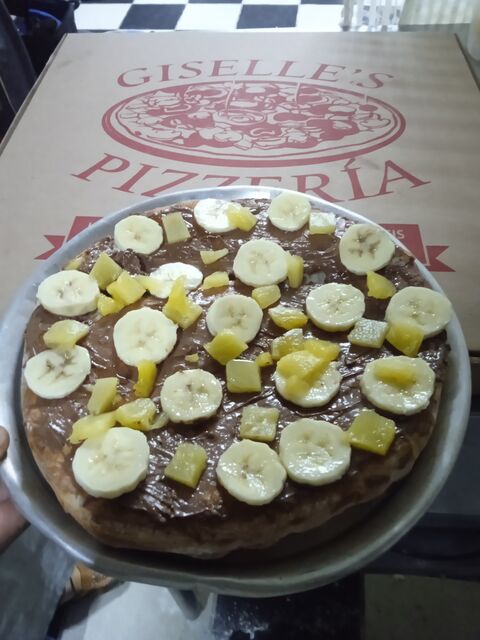 GISELLE'S PIZZERÍA y Algomas image 7