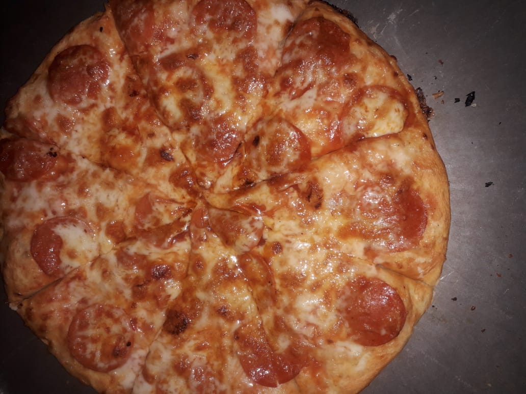 Flamingazos pizza pujlltic image 2