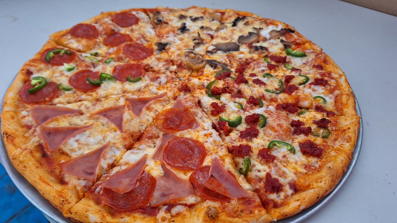 Pizzas Máximo Grado cocinando a un grado máximo image 1