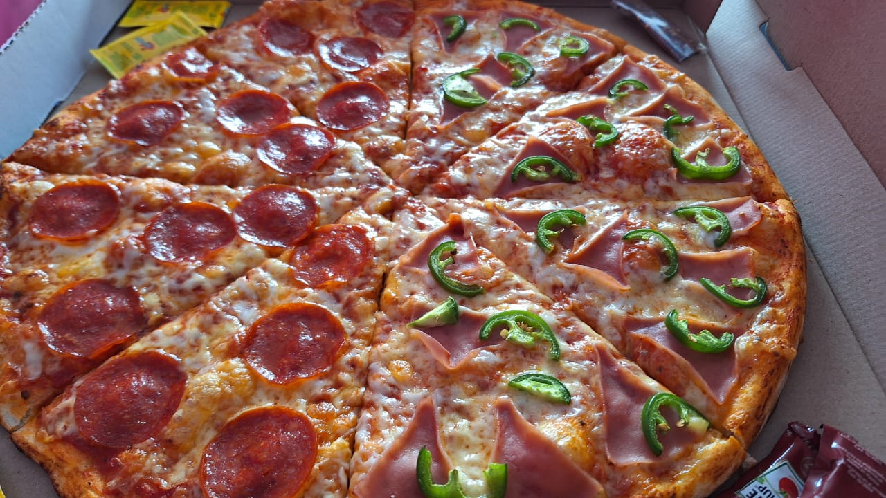 Pizzas Máximo Grado cocinando a un grado máximo image 3